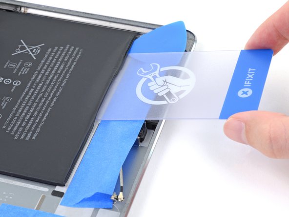 iPad Pro 9.7" Battery Replacement, Create a gap for the adhesive remover: step 115, image 2 of 3