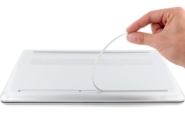 HP 15-dy RAM Replacement, Remove the front foot: crwdns2935265:04crwdnd2935265:02crwdnd2935265:03crwdne2935265:0