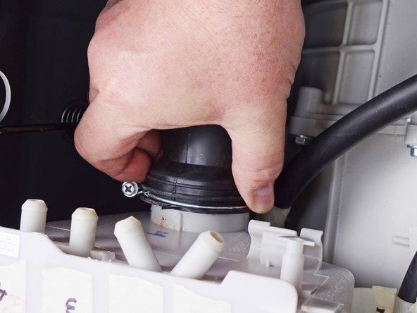 LG Front Load Washing Machine Detergent Dispenser Replacement, Disconnect the dispenser: crwdns2935265:013crwdnd2935265:02crwdnd2935265:03crwdne2935265:0