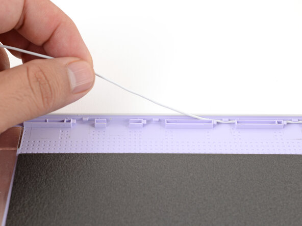 Framework Laptop 12 Top Cover Replacement, Unthread the antenna cables: step 11, image 2 of 3