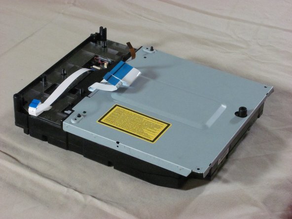 Playstation 3 Optical Drive Replacement: crwdns2935265:013crwdnd2935265:02crwdnd2935265:03crwdne2935265:0