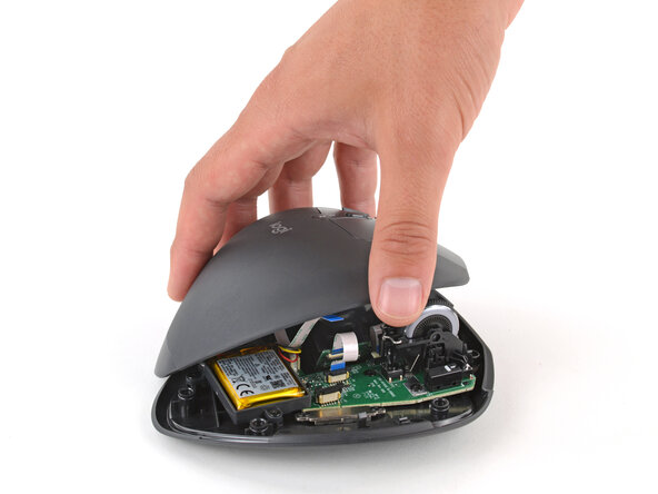 How to Open the Logitech MX Ergo, Remove the top half of the mouse: crwdns2935265:012crwdnd2935265:01crwdnd2935265:02crwdne2935265:0
