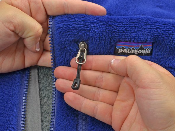 Zipper Pull Replacement, Tighten the pull: crwdns2935265:05crwdnd2935265:02crwdnd2935265:02crwdne2935265:0
