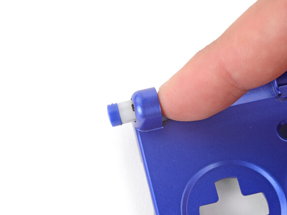 How to Reshell Your Game Boy Advance SP, Remove the left hinge: crwdns2935265:031crwdnd2935265:02crwdnd2935265:03crwdne2935265:0