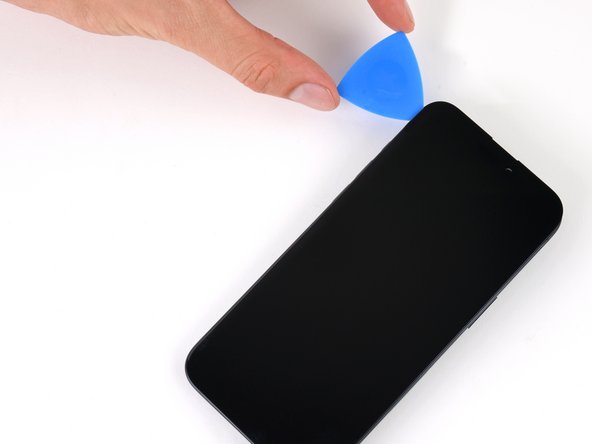 iPhone 14 Screen Replacement, Separate the left adhesive: step 12, image 2 of 3