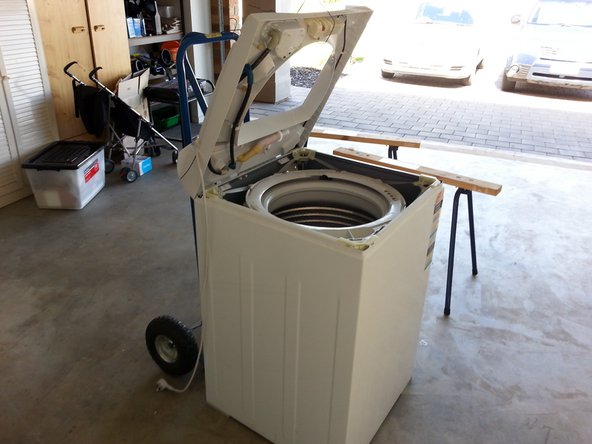 Fisher and Paykel Aquasmart Washing Machine Suspension Rods Replacement, Suspend the cover out of the way: crwdns2935265:04crwdnd2935265:02crwdnd2935265:02crwdne2935265:0