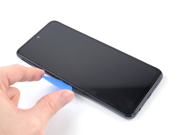 Xiaomi Redmi Note 10S Battery Replacement, Release the plastic clips: crwdns2935265:016crwdnd2935265:02crwdnd2935265:03crwdne2935265:0