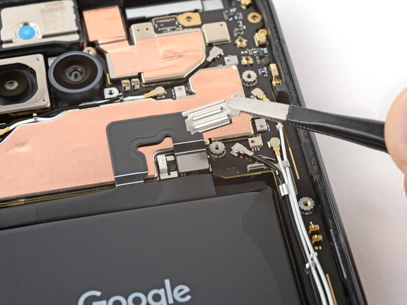 Google Pixel 9a Logic Board Replacement, Remove the battery connector cover: passo 16, immagine 3 di 3