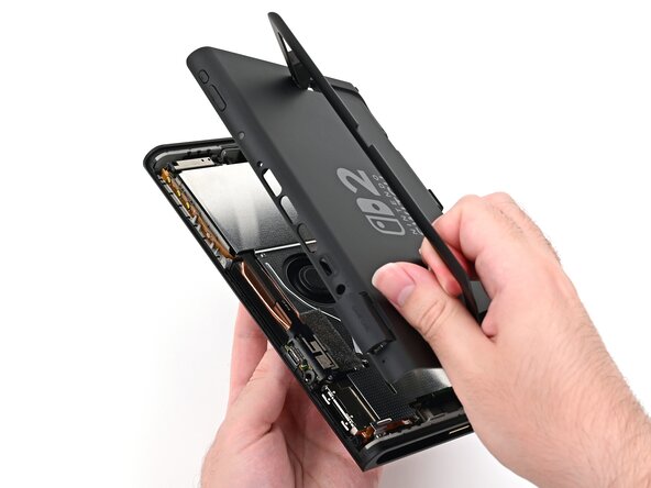 Nintendo Switch 2 Microphone Replacement, Install the back cover: crwdns2935265:052crwdnd2935265:01crwdnd2935265:03crwdne2935265:0