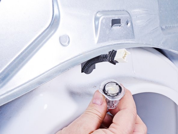 Whirlpool WED87HED Dryer Drum Light Replacement, Remove the drum light: crwdns2935265:013crwdnd2935265:03crwdnd2935265:03crwdne2935265:0