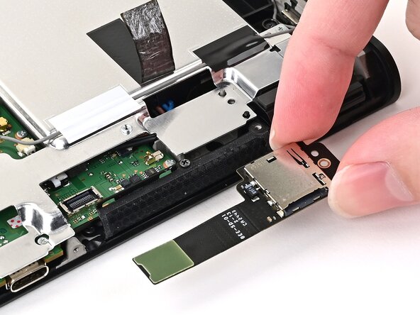 Nintendo Switch 2 MicroSD Card Reader Replacement, Install the MicroSD card reader: crwdns2935265:027crwdnd2935265:01crwdnd2935265:02crwdne2935265:0