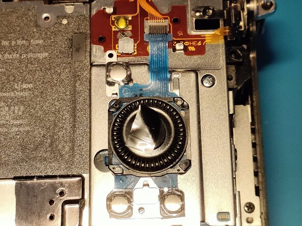 Sony A7 II Top Flex Cable replacement, Removing scroll wheel assembly 1: crwdns2935265:012crwdnd2935265:03crwdnd2935265:03crwdne2935265:0