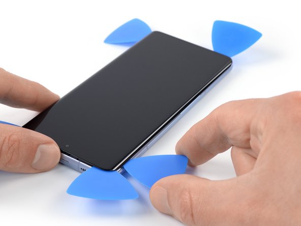 Xiaomi 12 Screen Replacement, Slice the left edge adhesive: crwdns2935265:029crwdnd2935265:02crwdnd2935265:02crwdne2935265:0