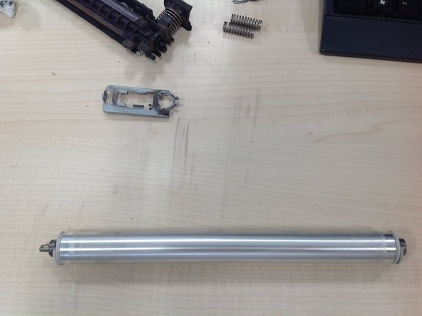 Repairing the Intermediate Transfer Belt (ITB), Clean the front roller: crwdns2935265:010crwdnd2935265:02crwdnd2935265:02crwdne2935265:0