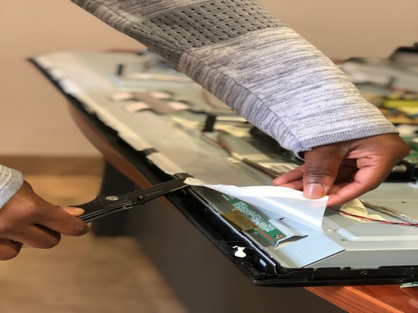 VIZIO TV Screen Replacement, Sticky film: step 10, image 2 of 3