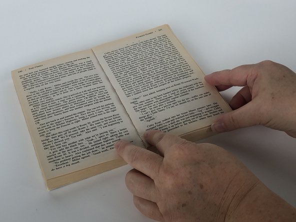 How to Reattach Loose Book Pages: step 4, image 3 of 3