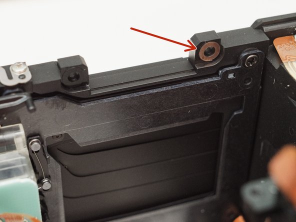 Pentax ZX-5n Mirror Motor Gear Replacement, Check for shims: crwdns2935265:027crwdnd2935265:01crwdnd2935265:01crwdne2935265:0