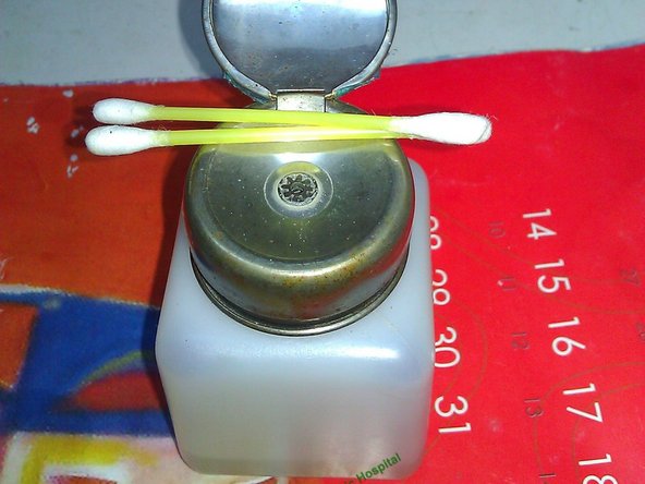 Use soft cloth (or wet tissue), soft cotton ear-pick and Acetone to clean 2 chips (CPU, GPU), heat sink thoroughly.