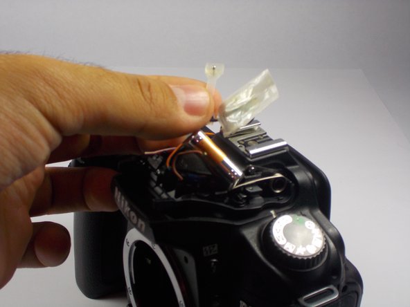 Nikon D90 Flash Bulb Replacement, Removing the Bulb: crwdns2935265:05crwdnd2935265:02crwdnd2935265:03crwdne2935265:0