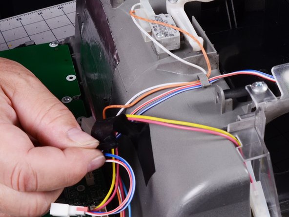 LG Refrigerator LFX25973 Display Board Replacement, Release the ice dispensing switch wires: crwdns2935265:012crwdnd2935265:02crwdnd2935265:02crwdne2935265:0