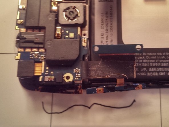 HTC One Display Assembly Replacement, Volume Button Detachment: crwdns2935265:011crwdnd2935265:02crwdnd2935265:02crwdne2935265:0