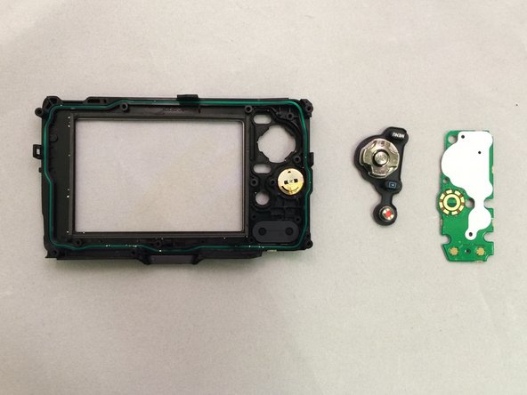 Olympus Stylus Tough TG-2 iHS Back Panel & Buttons Replacement: crwdns2935265:015crwdnd2935265:02crwdnd2935265:02crwdne2935265:0