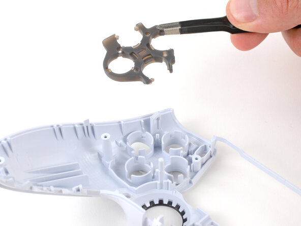 DualSense Controller V5 Front Case Replacement, Remove the silicone pad: crwdns2935265:034crwdnd2935265:02crwdnd2935265:02crwdne2935265:0