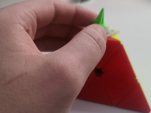 How to Reassemble a Pyraminx: step 6, image 2 of 3