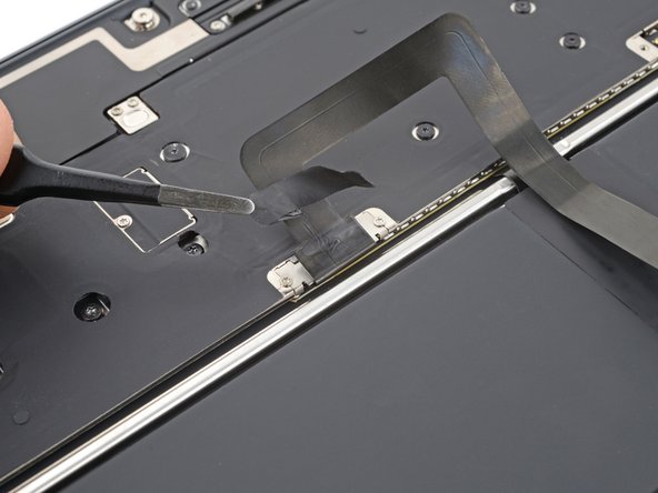 MacBook Air 15" 2024 Trackpad Replacement, Remove the trackpad cable tape: crwdns2935265:011crwdnd2935265:02crwdnd2935265:02crwdne2935265:0