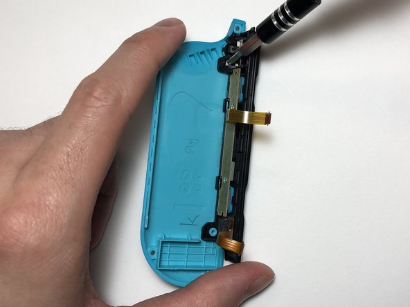 Left Joy-Con Charging Rail Replacement: crwdns2935265:011crwdnd2935265:02crwdnd2935265:02crwdne2935265:0