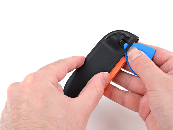 Joy-Con 2 (Right) Joystick Replacement, Install the back cover: crwdns2935265:046crwdnd2935265:03crwdnd2935265:03crwdne2935265:0