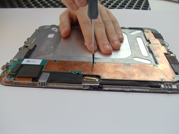 Lenovo IdeaTab S2109A-F System Board Replacement, Unscrewing the System Board: crwdns2935265:04crwdnd2935265:02crwdnd2935265:02crwdne2935265:0