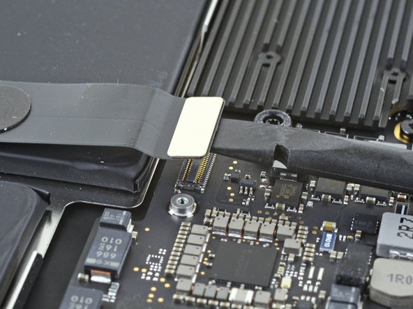 MacBook Air 13" Early 2020 Trackpad Replacement, Disconnect the trackpad cable: crwdns2935265:07crwdnd2935265:02crwdnd2935265:02crwdne2935265:0