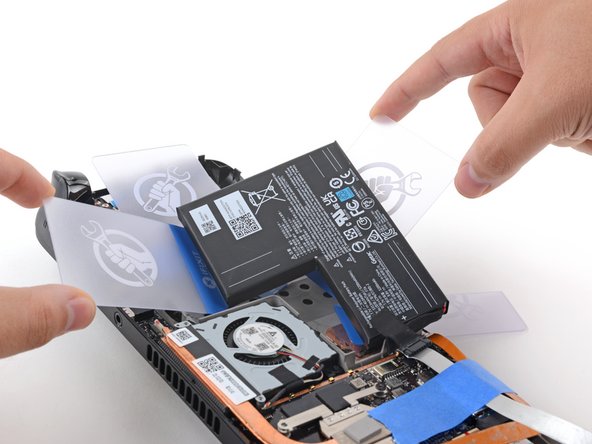 Steam Deck Battery Replacement, Pry out the battery: crwdns2935265:020crwdnd2935265:03crwdnd2935265:03crwdne2935265:0