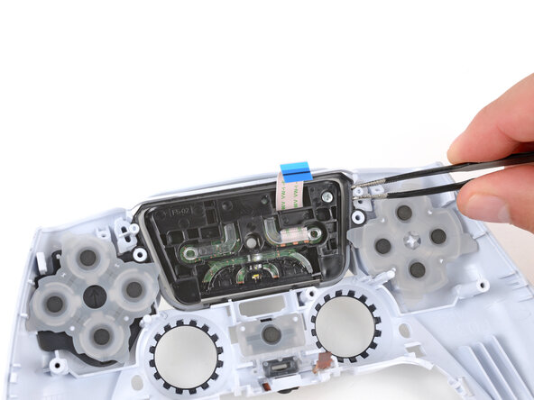 DualSense Controller V5 Touchpad Replacement, Remove the Options and Create buttons: crwdns2935265:032crwdnd2935265:01crwdnd2935265:03crwdne2935265:0
