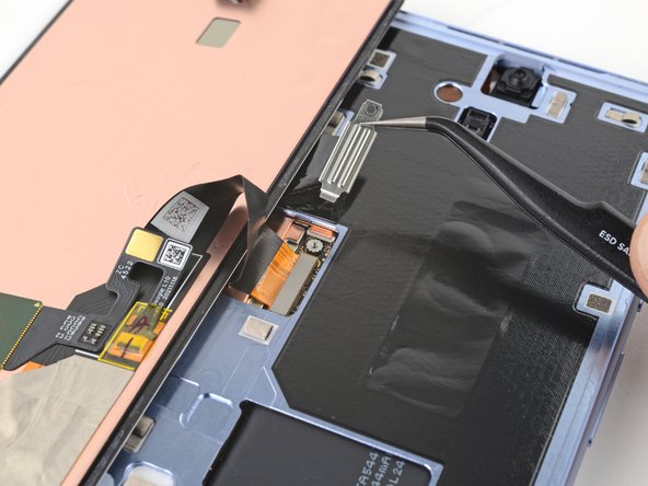 Google Pixel 7a Screen Replacement, Remove the screen connector cover: crwdns2935265:011crwdnd2935265:03crwdnd2935265:03crwdne2935265:0