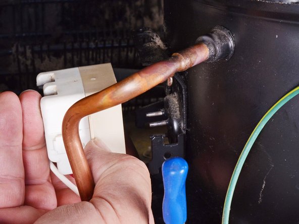 Whirlpool Refrigerator Motor Thermal Protector and Start Relay Assembly Replacement, Remove the assembly: step 6, image 2 of 2