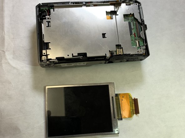 Nikon Coolpix S9050 LCD Screen Replacement: crwdns2935265:06crwdnd2935265:02crwdnd2935265:02crwdne2935265:0