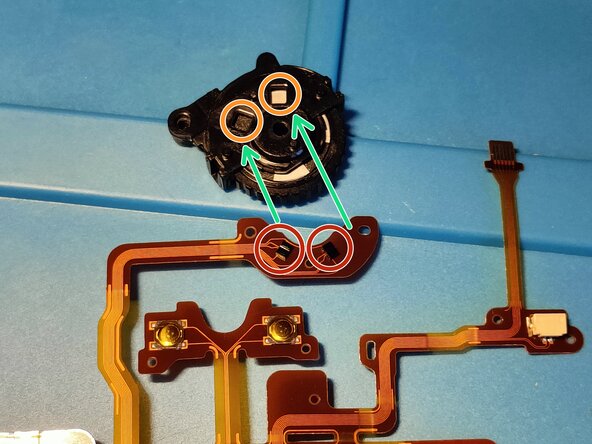 Sony A7 II Top Flex Cable replacement, Attaching the scroll wheel to the new Top Flex Cable: crwdns2935265:030crwdnd2935265:02crwdnd2935265:03crwdne2935265:0