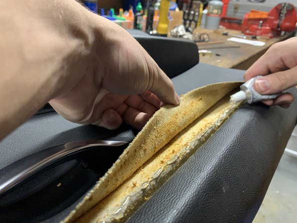 Now that the door panel is free from the car, move it to a flat workspace.