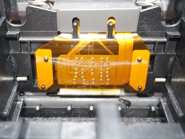 Gentle method - HP Photosmart Plus B210a Printhead Cleaning, Clean the printer contacts: crwdns2935265:03crwdnd2935265:02crwdnd2935265:02crwdne2935265:0