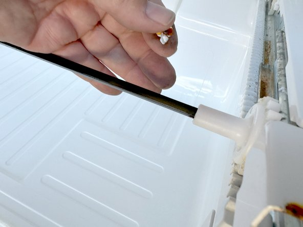 Samsung Older French Door Refrigerator Freezer Drawer Replacement, Remove the drawer slide connecting rod: crwdns2935265:08crwdnd2935265:02crwdnd2935265:02crwdne2935265:0