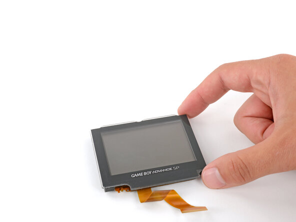 Nintendo Game Boy Advance SP Screen Lens Replacement, Remove the screen lens: crwdns2935265:030crwdnd2935265:01crwdnd2935265:03crwdne2935265:0