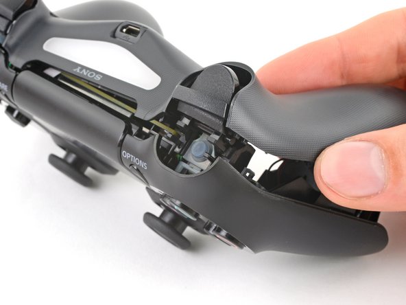DualShock 4 (CUH-ZCT1U) Speaker Replacement, Remove the rear case: crwdns2935265:09crwdnd2935265:03crwdnd2935265:03crwdne2935265:0