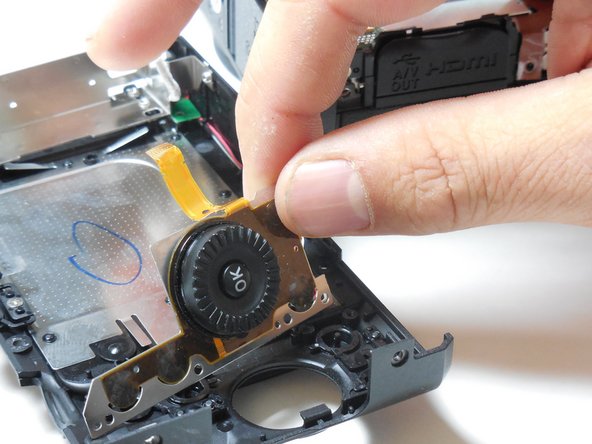 Nikon COOLPIX P7700 Multi Selector Wheel Replacement: crwdns2935265:09crwdnd2935265:02crwdnd2935265:02crwdne2935265:0