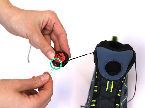 How to Replace a Dial-Lace System in a Hiking Boot, Adjust the lace: crwdns2935265:014crwdnd2935265:03crwdnd2935265:03crwdne2935265:0