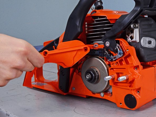 Echo Chain Saw CS4910 2020 Oiler System Replacement, Remove the brake cover: crwdns2935265:015crwdnd2935265:03crwdnd2935265:03crwdne2935265:0