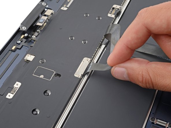 MacBook Air 15" 2023 Battery Replacement, Separate the trackpad cable adhesive: crwdns2935265:033crwdnd2935265:02crwdnd2935265:02crwdne2935265:0