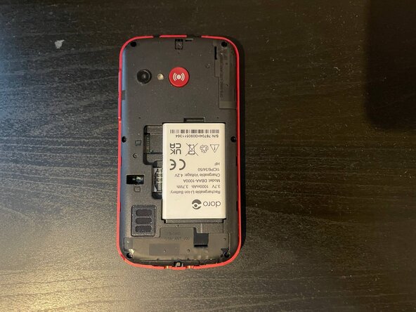 Doro 1881 Teardown, Remove the battery: crwdns2935265:02crwdnd2935265:01crwdnd2935265:03crwdne2935265:0