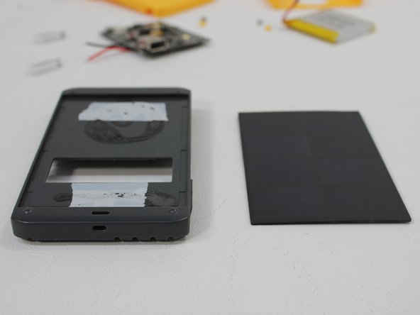 Waka Waka Power Plus Solar Panel Replacement, Pry out the solar panel: crwdns2935265:06crwdnd2935265:02crwdnd2935265:02crwdne2935265:0